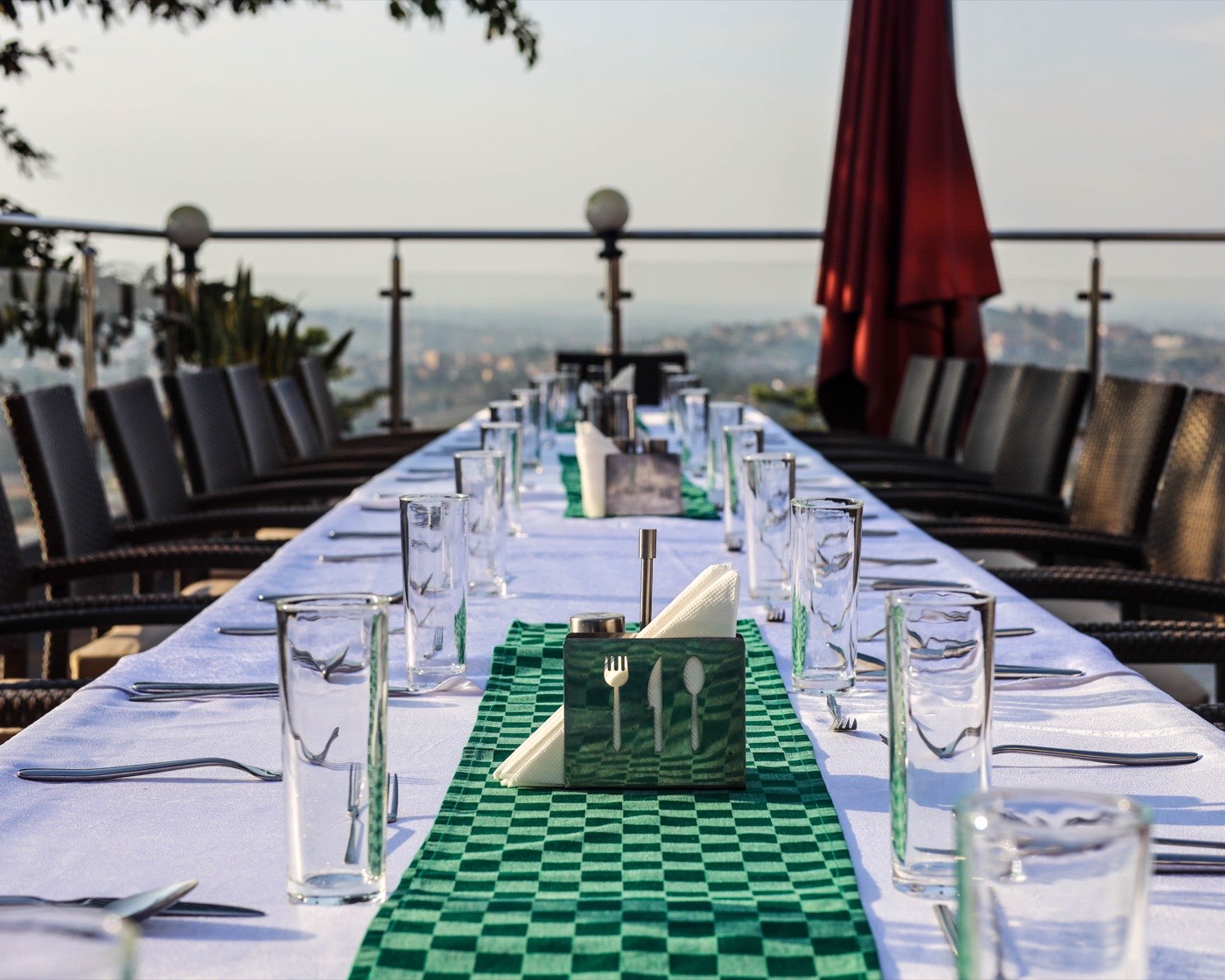 Aruba Terrace, an intimate outdoor dining terrace with sweeping Kampala views