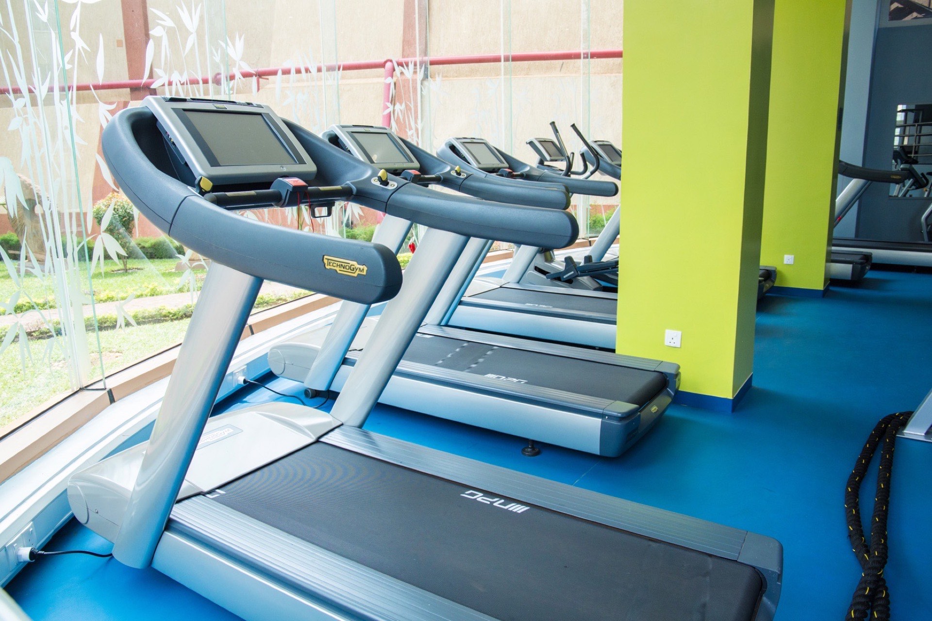 Strength machines and a free-weight bench in the Skyz Gym