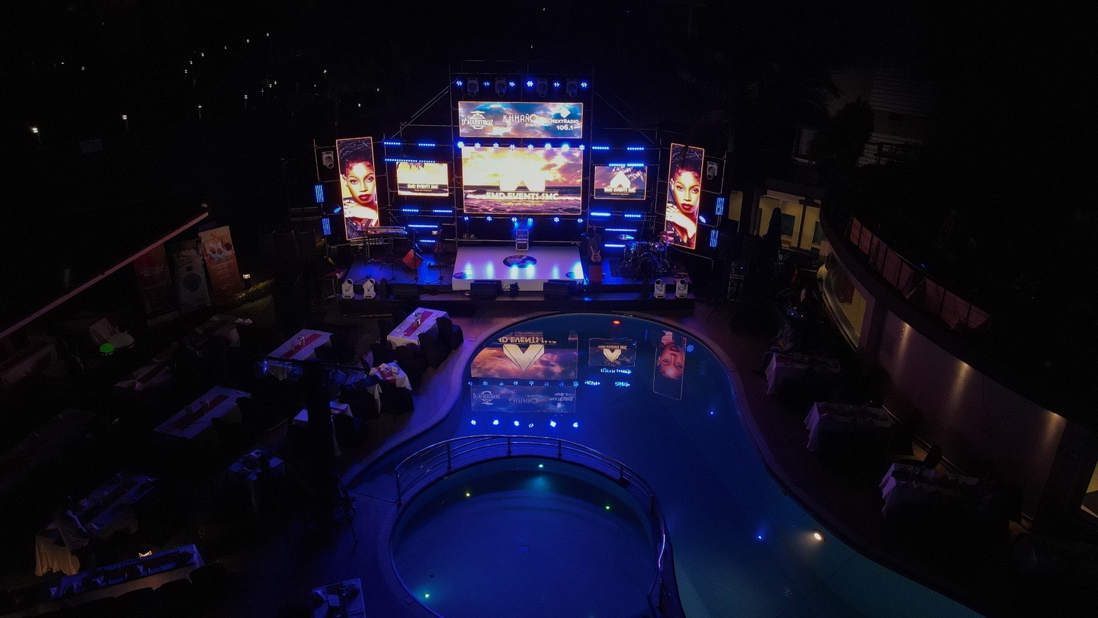 Tropicanna Poolside set up for an evening event with ambient lighting